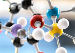 Close-up of a colorful molecular structure model symbolizing Denacol EX-252 by Nagase, a multifunctional epoxy compound used in chemical formulations to enhance reactivity, adhesion, and durability.