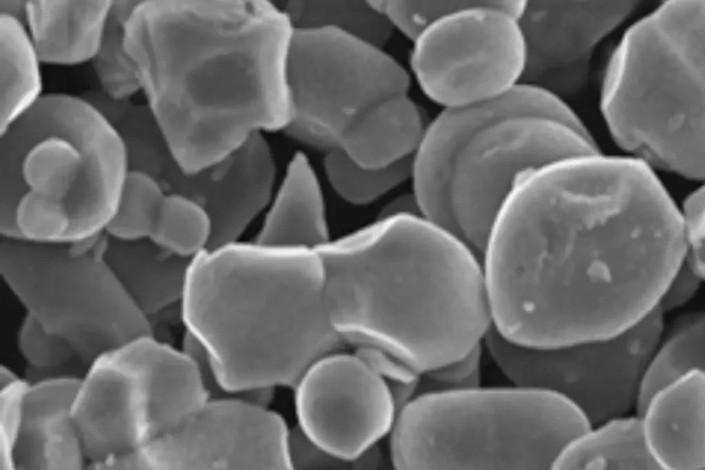 Reshine-3 SEM image of cathode material with angular particle morphology – suitable for high-rate lithium-ion battery applications.