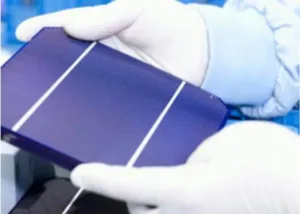 Gloved technician handling a silicon wafer used in ALD processes with Trimethylaluminum (TMA), supplied by NAGASE