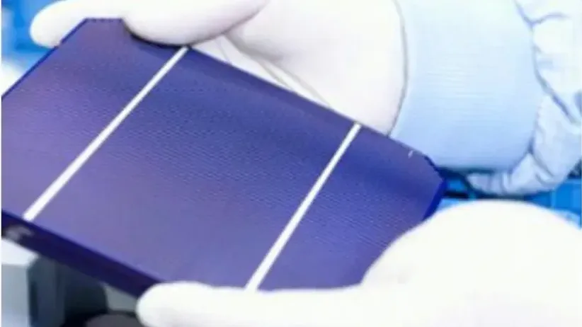 Gloved technician handling a silicon wafer used in ALD processes with Trimethylaluminum (TMA), supplied by NAGASE