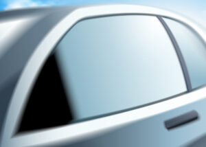 Close-up of a modern car window and frame under sunlight, representing Nagase Eneos EXCELINK® TPV (EXCELINK 1200-1800) for mobility applications, delivering high durability, flexibility, and weather resistance in automotive sealing solutions.