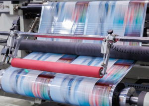 High-speed printing process with colorful film rolls, optimized by Nagase wax additives for improved print quality, durability, and performance in advanced printing applications.