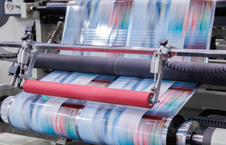 High-speed printing process with colorful film rolls, optimized by Nagase wax additives for improved print quality, durability, and performance in advanced printing applications.