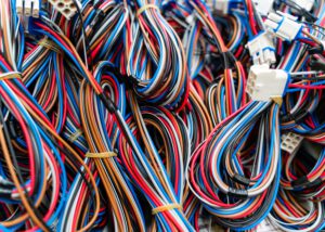 Colorful plastic-coated electrical wires produced with Nagase FCM masterbatches, delivering high-performance compounds for durability, flexibility, and advanced plastic applications.