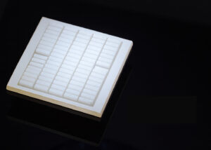 Close-up of NAGASE HCCF intelligent humidity control material with microporous ceramic structure for advanced water vapor and condensation regulation.