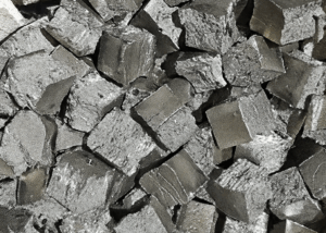 High-purity Yttrium metal cubes with silvery metallic luster, used in advanced alloys, ceramics, phosphors, and electronic materials supplied by NAGASE.